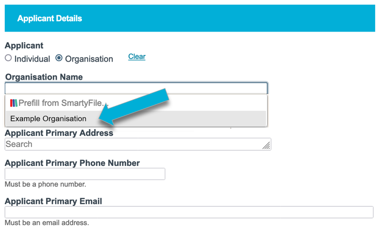 Arrow points to the dropdown showing the prefill result